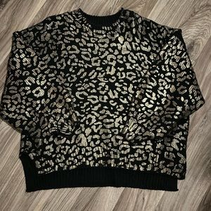 Black and gold sweater